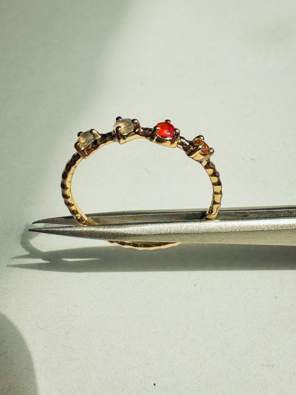 18ct gold-plated sterling silver ring with carnelian, citrine, and labradorite stones on a beaded band