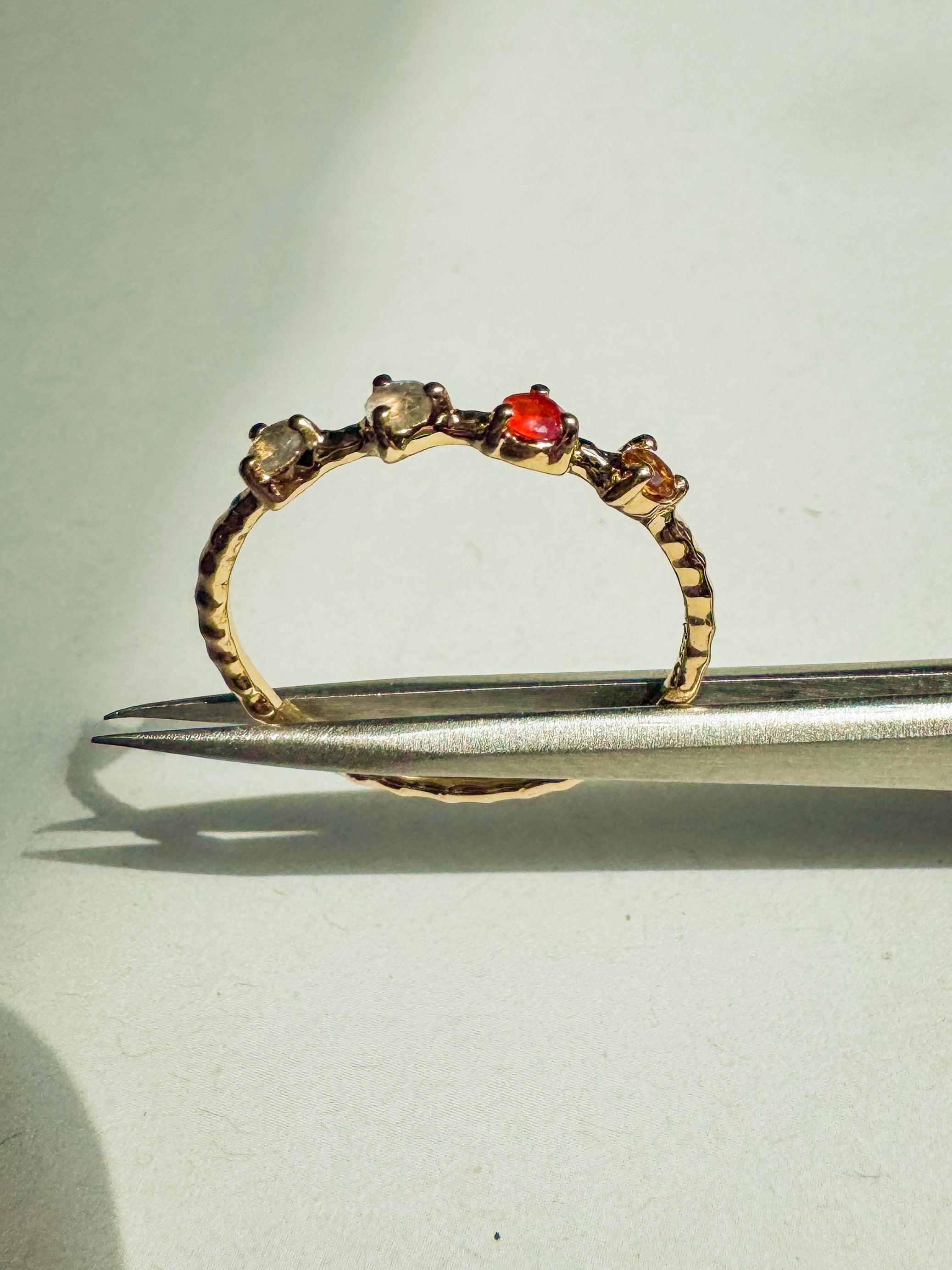 18ct gold-plated sterling silver ring with carnelian, citrine, and labradorite stones on a beaded band